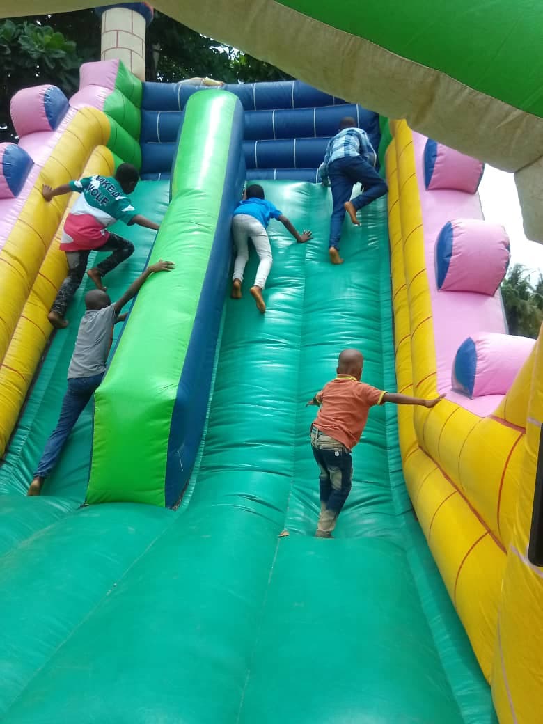Fun Day — learners enjoying the inflatable slide